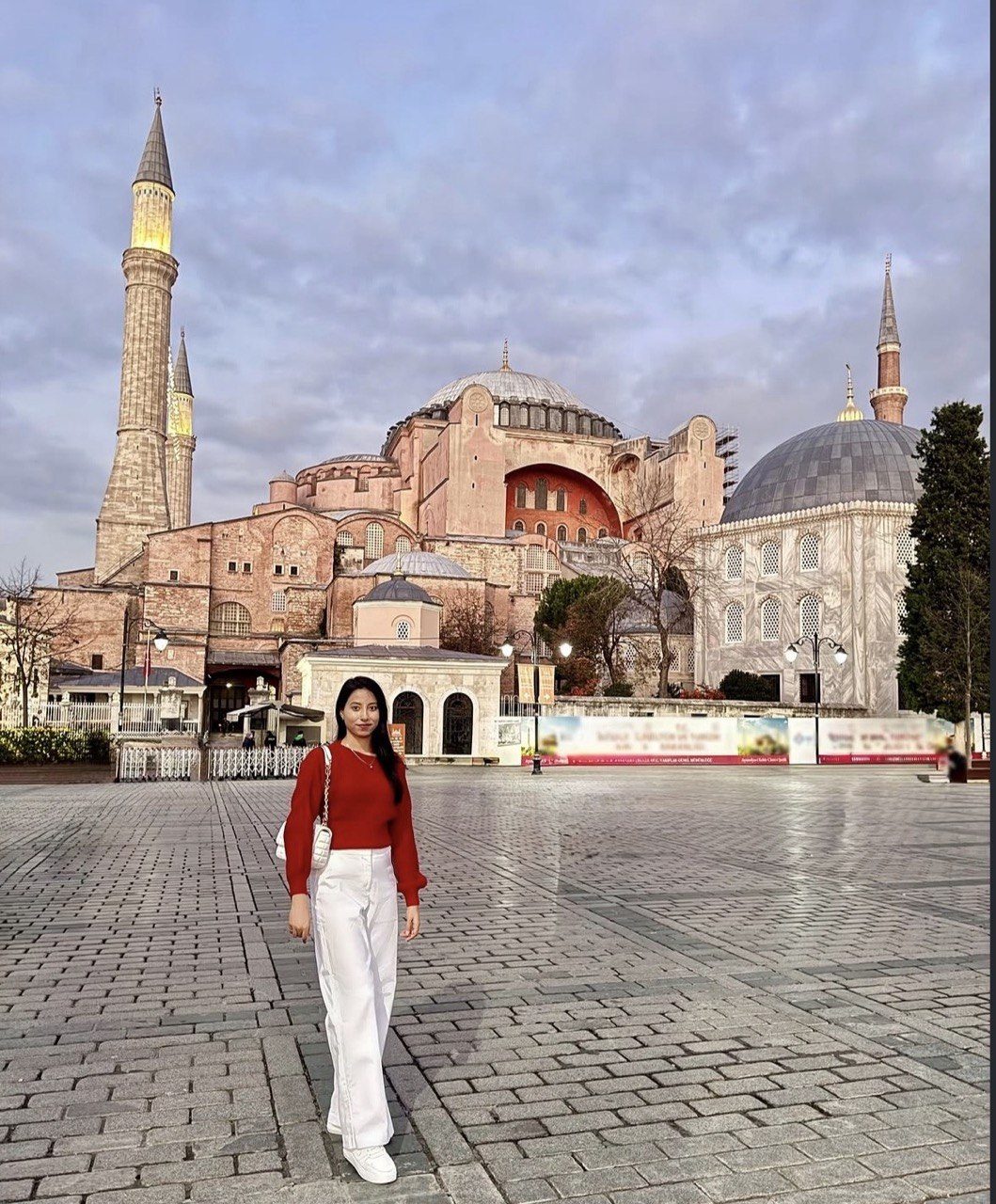 Istanbul tram on the T1 line passing through Sultanahmet district near the historic mosque