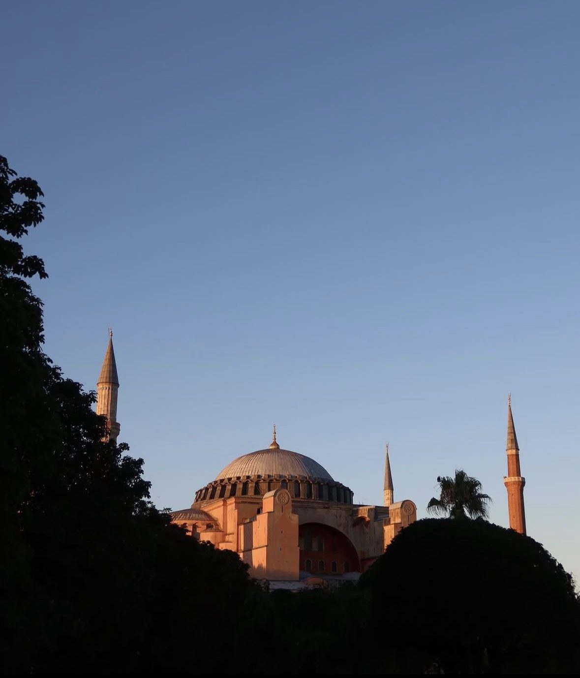 Aerial view of the Sultanahmet skyline in autumn with minarets and the Bosphorus in soft golden light